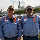 Joe Jenkins and Shane Miller standing outside of Logan Aluminum